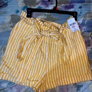 Cute yellow and white stripe shorts with a removable belt.